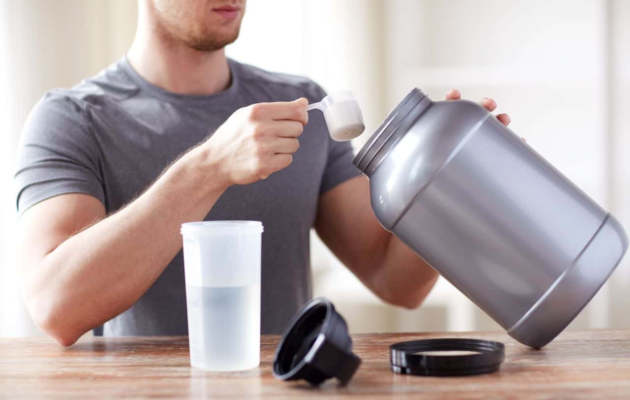 Man With Protein Shake Bottle