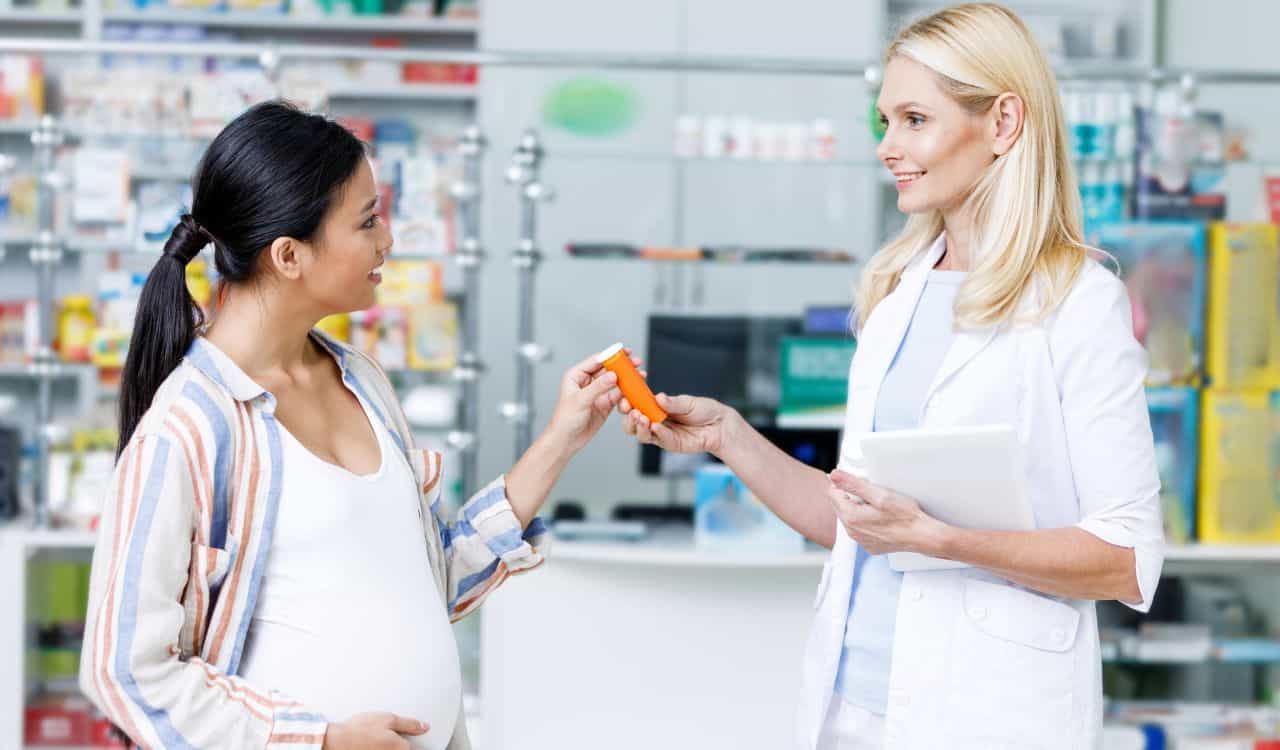 Doctor Advices Pregnant Woman about Prenatal Multivitamin