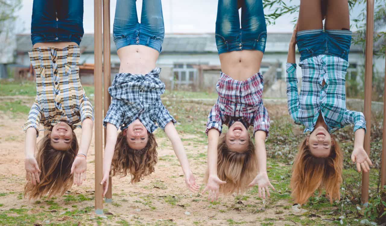 Girls Hanging Upside Down