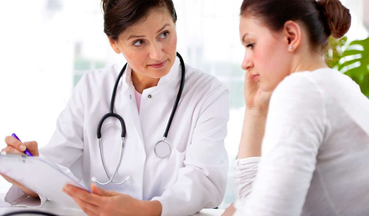 Patient Discussing with Doctor