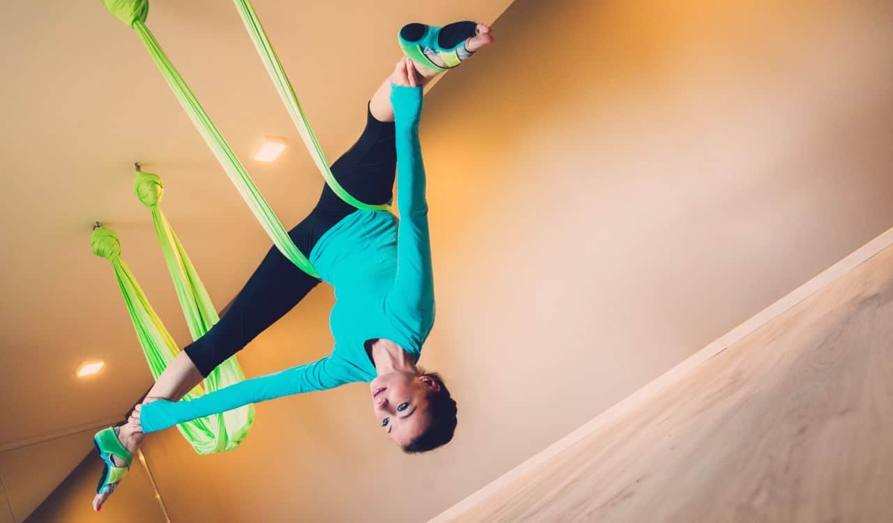 Woman Inverting Inversion Swing