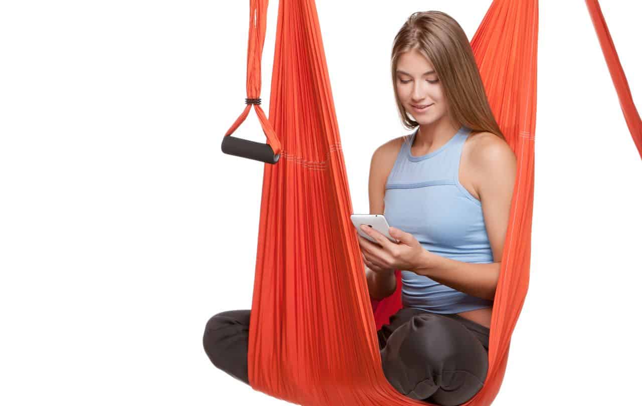 Woman Sitting on Inversion Swing