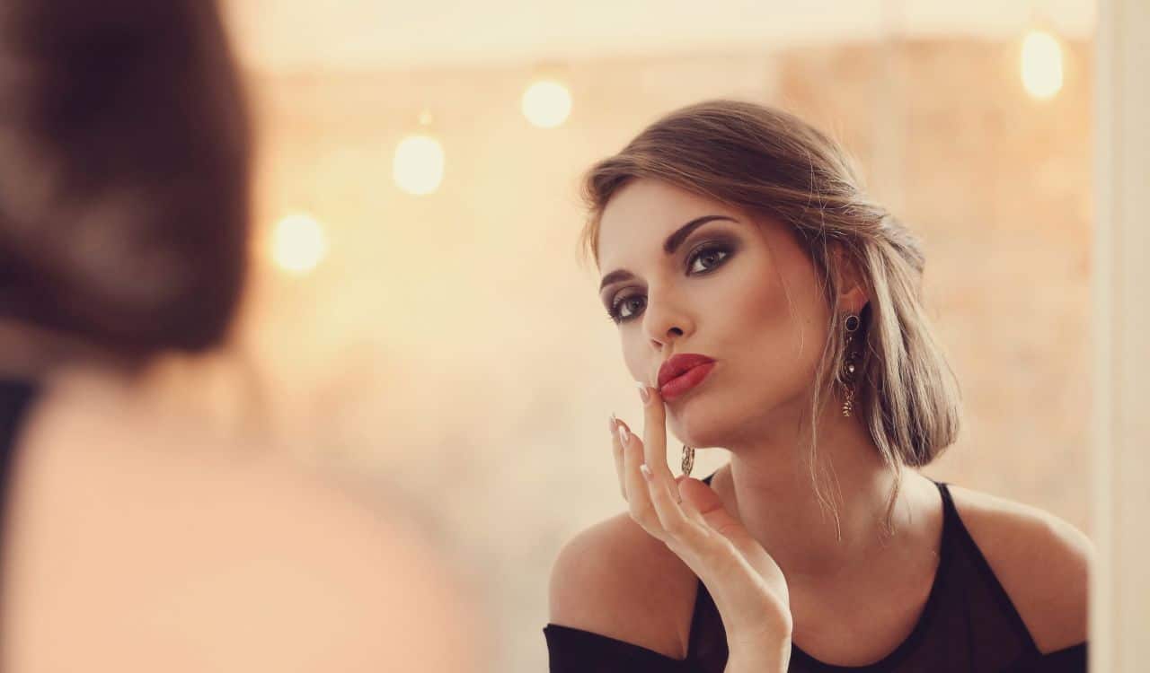 Woman In Front Of Mirror