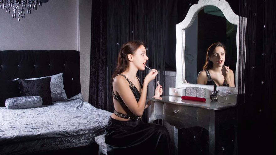 How to Set Up the Perfect Makeup Vanity Glamorous Young Woman Applying Makeup