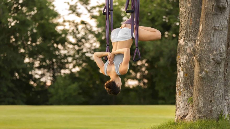Woman Inverting Inversion Swing
